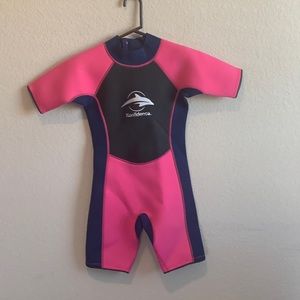 Girl’s pink shorty wetsuit new with tags size 11-12 yr old